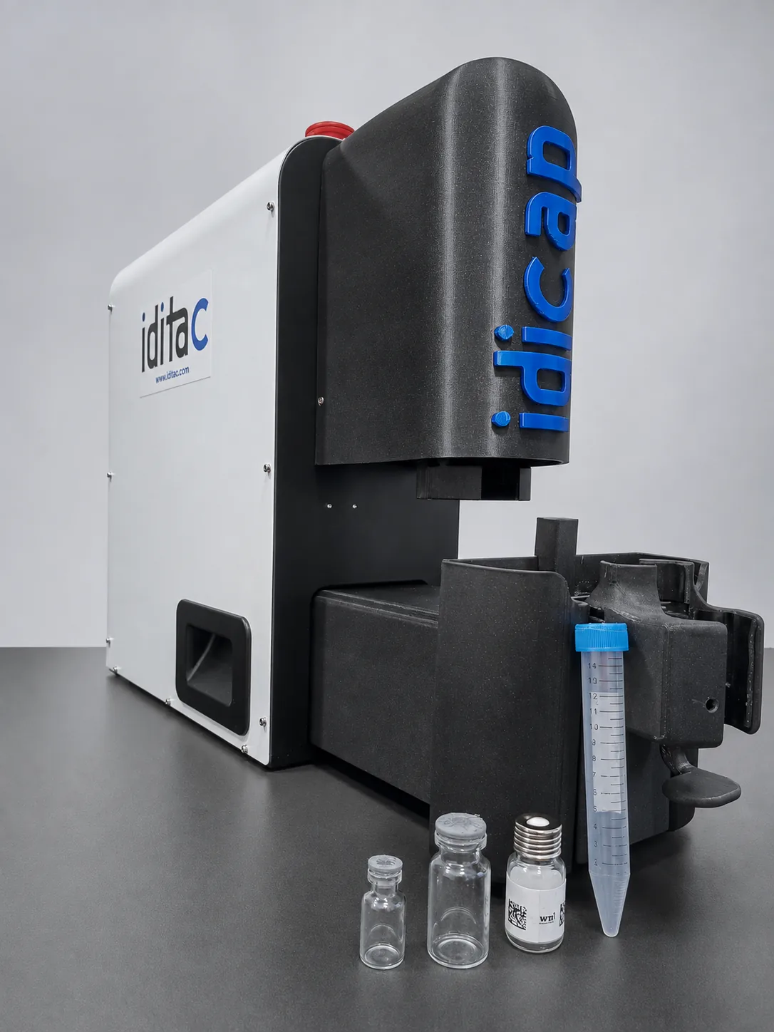 IdiCap with a 15 ml conical tube, a screw-cap vial and two silicone vials